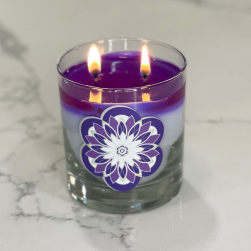 kromara summer purple candle, lit, full wax pool